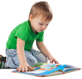 Toddler reading on floor