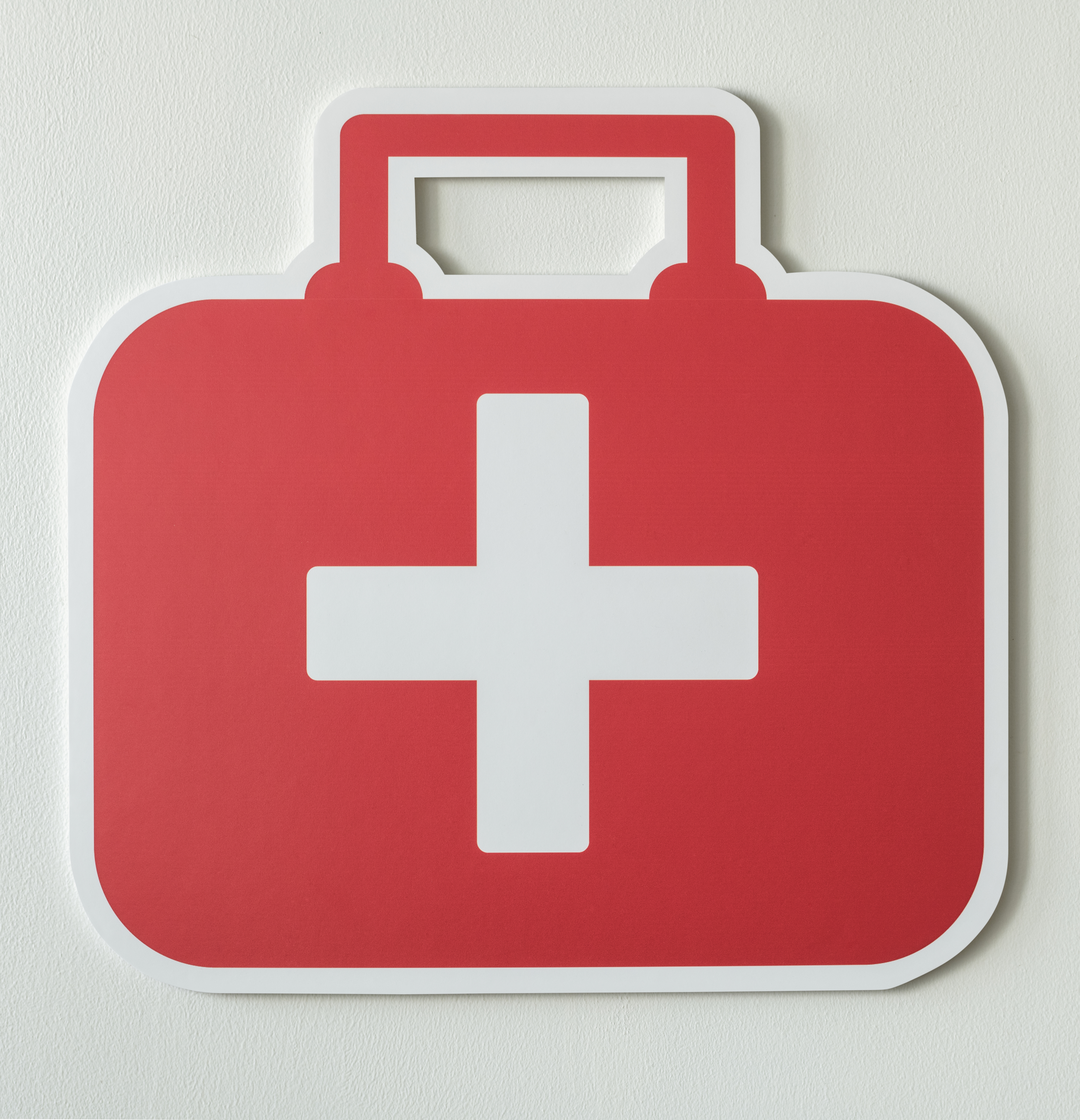 Illustration of a red doctor's bag with a white cross on it