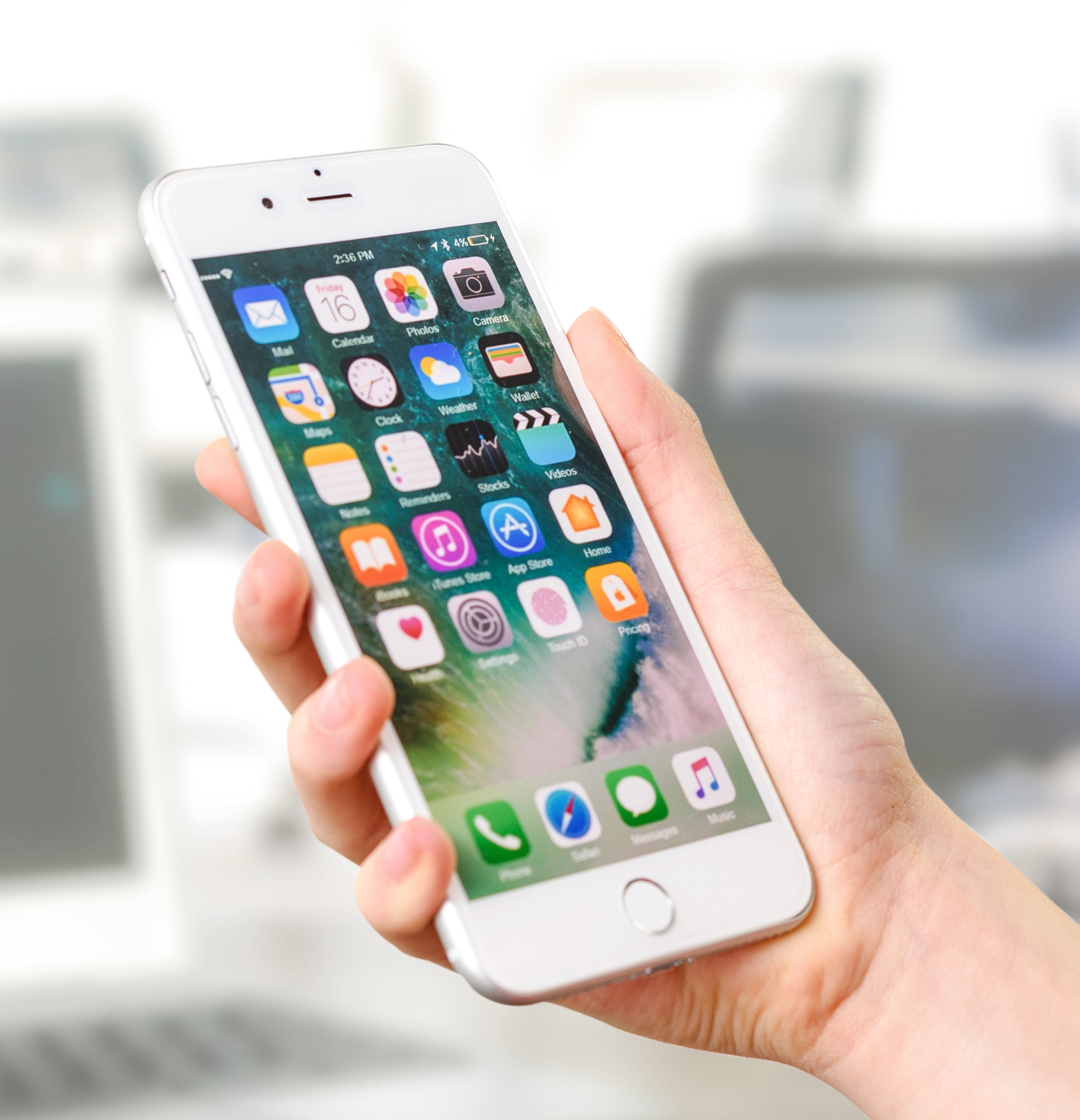 A person holding up a smartphone