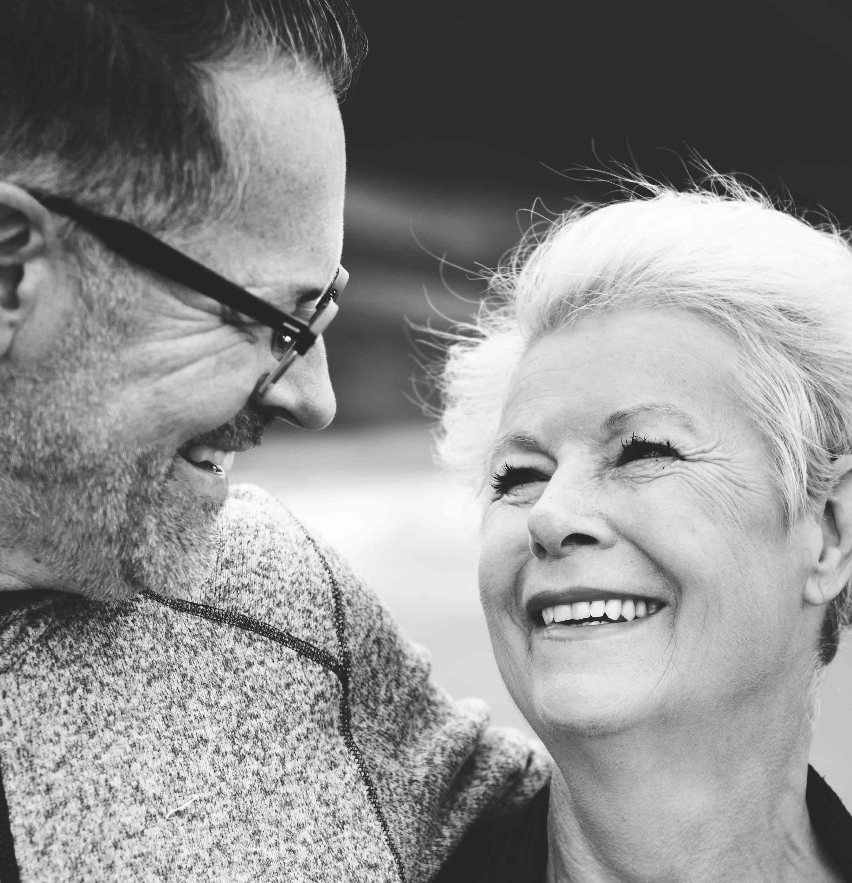 Image of two seniors talking.