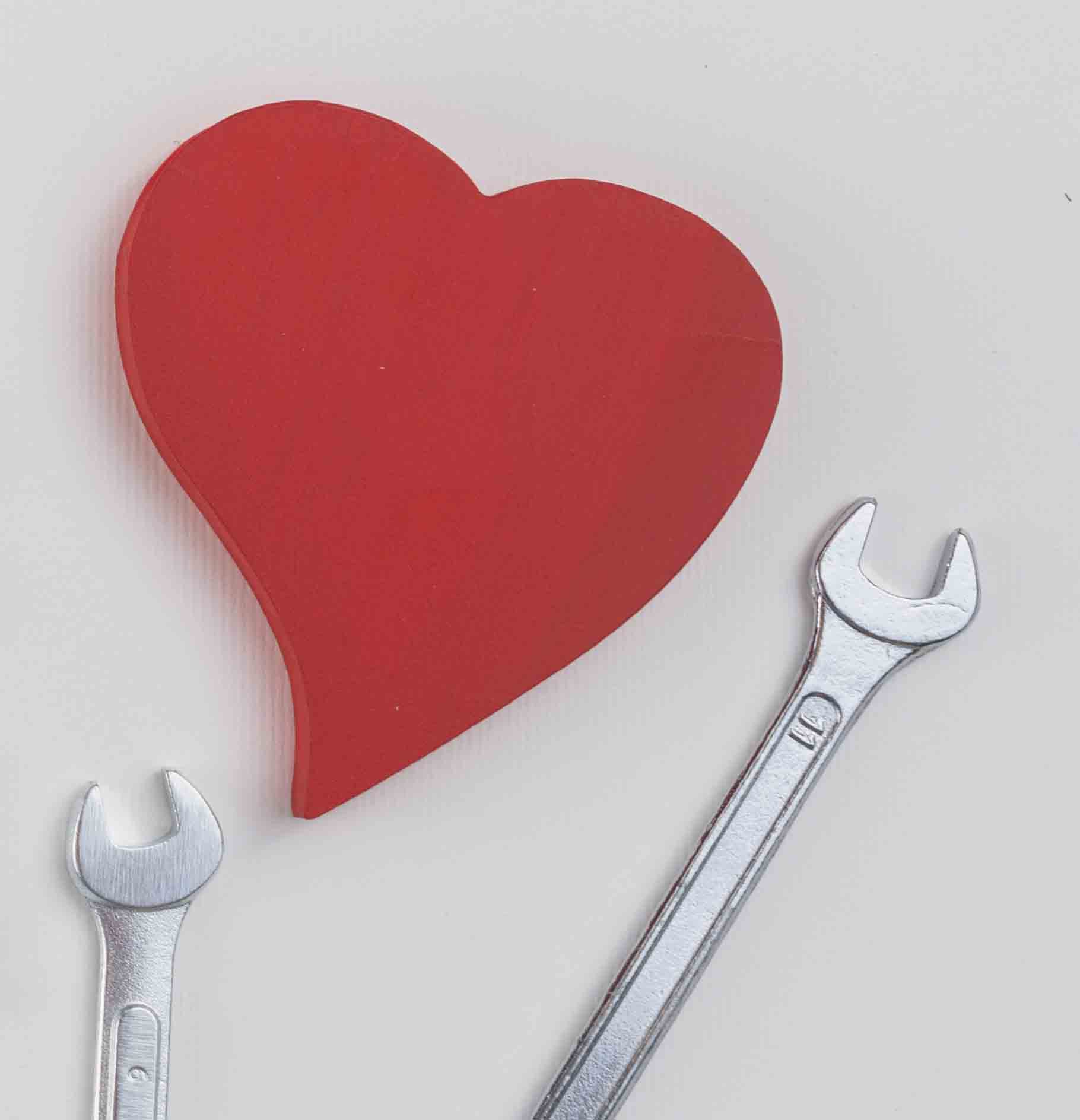 tools and a paper heart