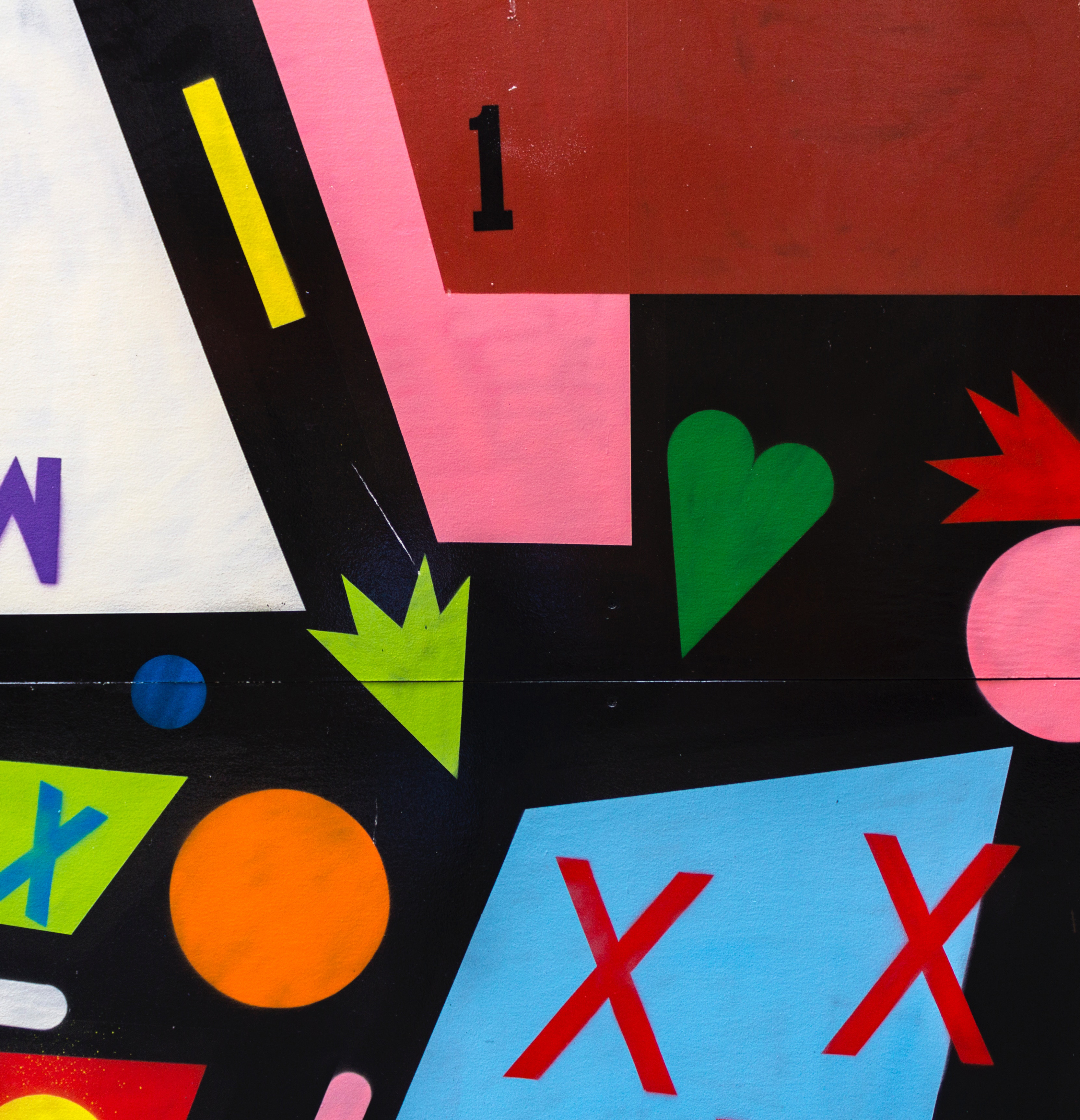 An abstract painting with various coloured shapes