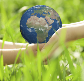 hands holding a globe
