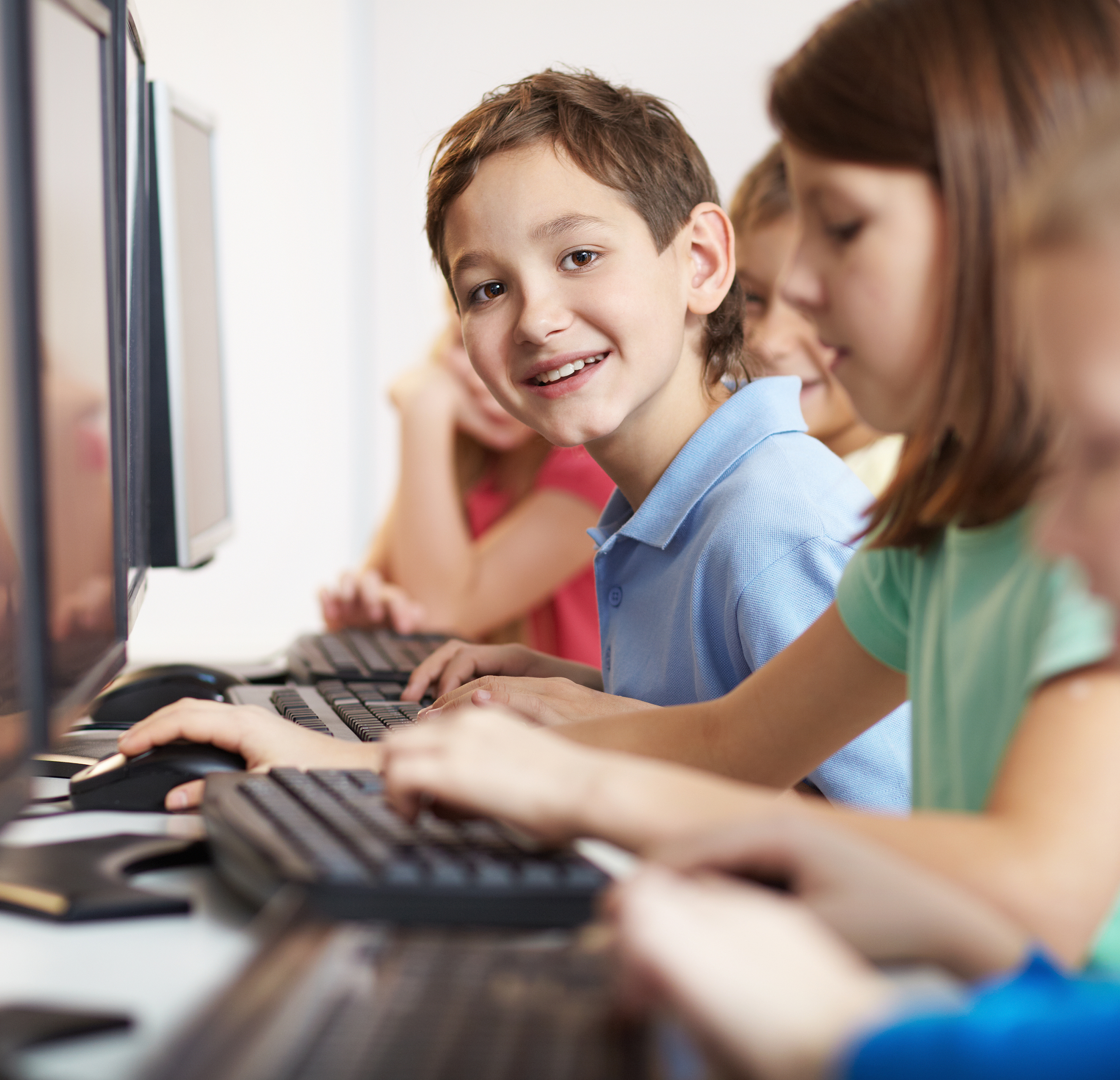 A picture of kids on computers