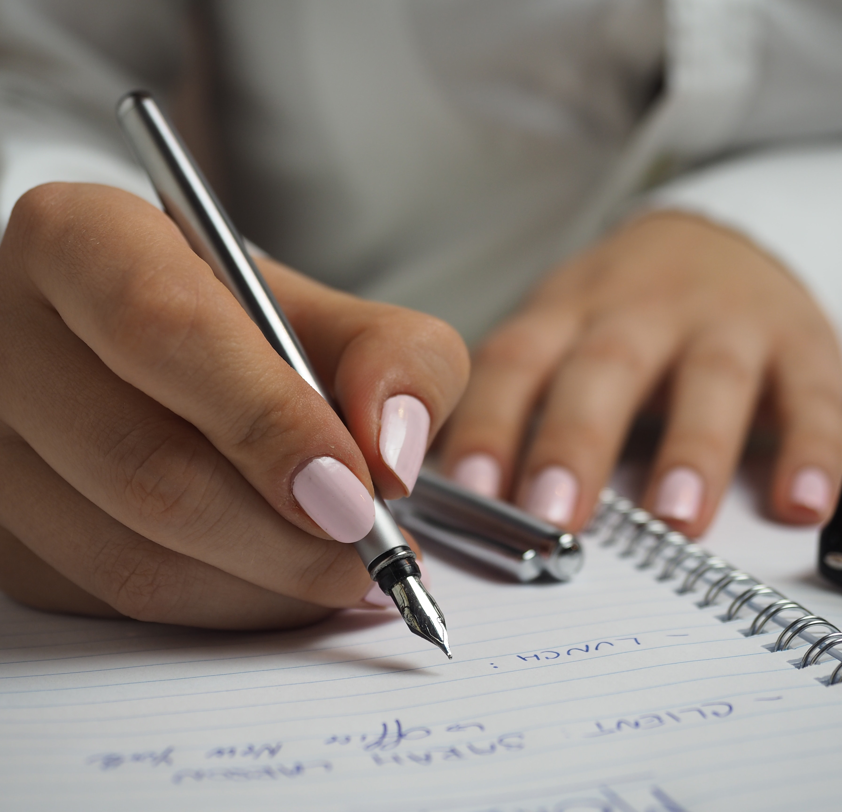 hand writing in a notebook