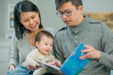 Asian family reading
