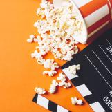 popcorn and movie clapperboard