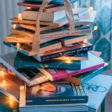 A stack of books covered in LED lights