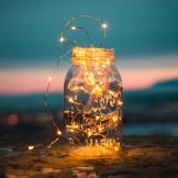 Photograph of a mason jar with led lights inside