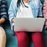 image of a teenager with a laptop