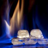 flames behind a stack of ice cubes