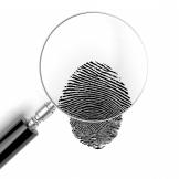 Image of a magnifying glass and fingerprint