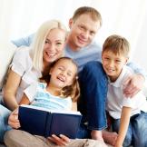 family reading a book