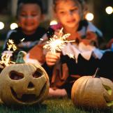 Image of kids and Halloween crafts.