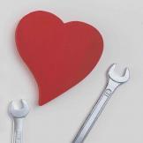 tools and a paper heart