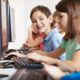 A picture of kids on computers