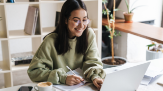 girl sitting in front of computer