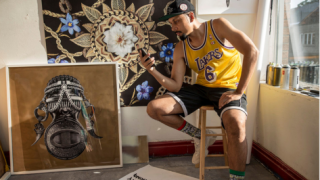 Adeyemi Adegbesan portrait with his art
