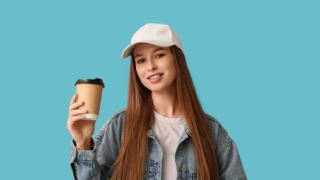 teen girl holding coffee