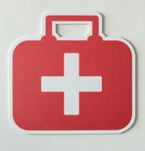 red bag with white cross